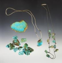 Group of assorted turquoise nuggets and jewelry. Largest section of turquoise is 2 3/16".