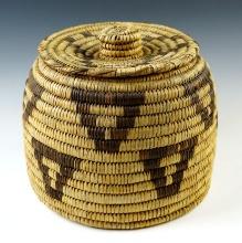 7" tall by 8" wide Vingate Papago Lidded Basket in excellent condition.
