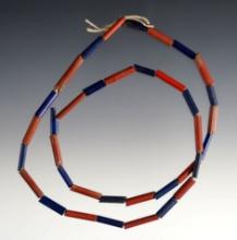 17" Strand of red, blue and striped Tubular Straw Beads. Recovered at the Dann Site, NY