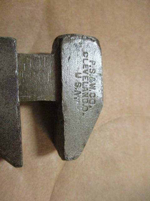 Three Antique Pipe Wrenches and Spring Scale