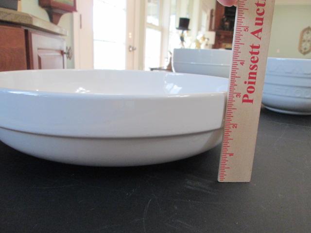 Three Large White Stoneware Bowls and Platter