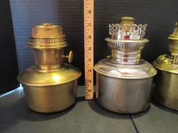 Three Brass and One Silver Metal Lamp Oil Fonts