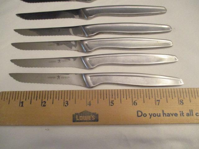 Eight J A Henckels Stainless Knives