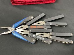 Group of 5 Multitools, marked w/ company logos, incl driver bit, knives, opener tools