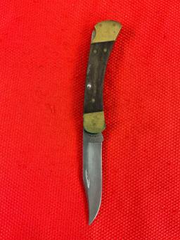 Vintage Buck 3.75" Steel Folding Blade Pocket Knife Model 110 w/ Ebony Handle & Original Sheath. ...