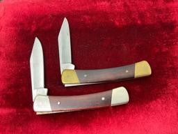 Pair of Vintage Buck 704 Single Blade Folding Pocket Knives Slip Joint, one w/ Brass metal