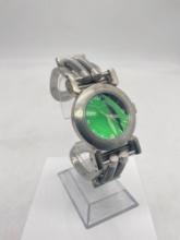 Android stainless steel watch in fair cond with bright green face, missing pin