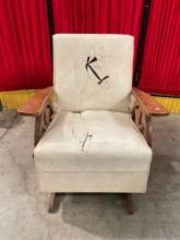 Vintage Wooden Rocking Chair w/ Cream Vinyl Upholstery, Wagon Wheel Arms & Horse Applique. See pi...