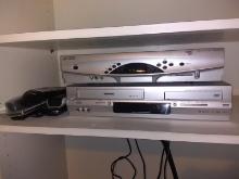 Toshiba VHS/DVD Player, and Scientific America Channel Box with Remotes