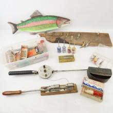 Decorative fish, lures on driftwood, reloader