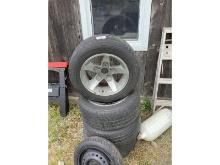 235/55/R16 Tires on 5 Bolt Aluminum Rims Plus Spare