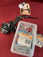 Assorted heavy duty staples, ignition, hammer holder, handsaw