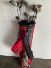 Forst Flight golf bag and 13 assorted golf clubs