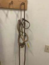 Leather horse halter with lead .
