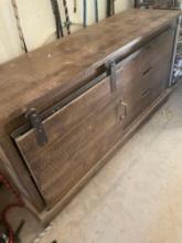 Rustic wood storage cabinet, three drawers with roller door. 31" T x 60" W x 19" D