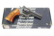 Boxed Smith & Wesson DA Revolver, Model 586, .357 MAG caliber, SN AFV7271, blue finish with light tu
