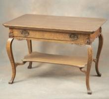 Antique quarter sawn oak Library Table, circa 1900, with carved cabriole legs and fancy stretcher ba