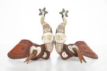 Fine pair of â€œBill Adamsonâ€� marked, double mounted Spurs, hand engraved silver overlay with arro