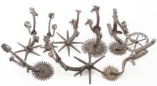 Collection of Nine (9) early single Iron Mexican Spurs, all have large rowels and fancy iron work. O