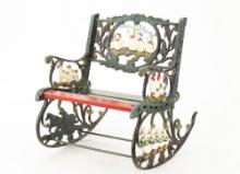 Cast iron Childs Rocking Bench with embossed chickens, ducks and horses at back and under arms, with