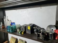 Contents of Shelf - Old Cameras, Glass Bottles, Glass Door Knobs, Glass Insulators