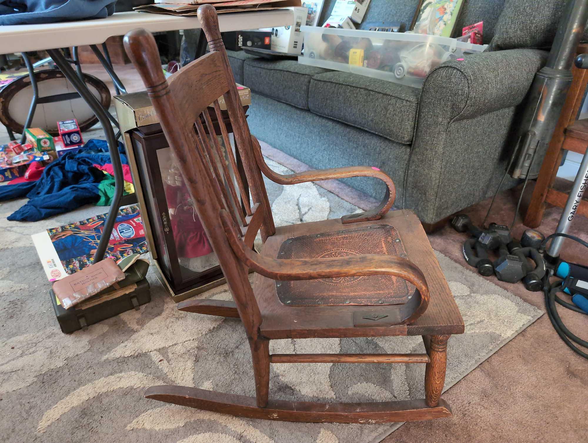 (LR) ANTIQUE OAK SPINDLE BACK CHILD'S ROCKING CHAIR WITH TOOLED LEATHER SEAT, NAIL HEAD TRIM