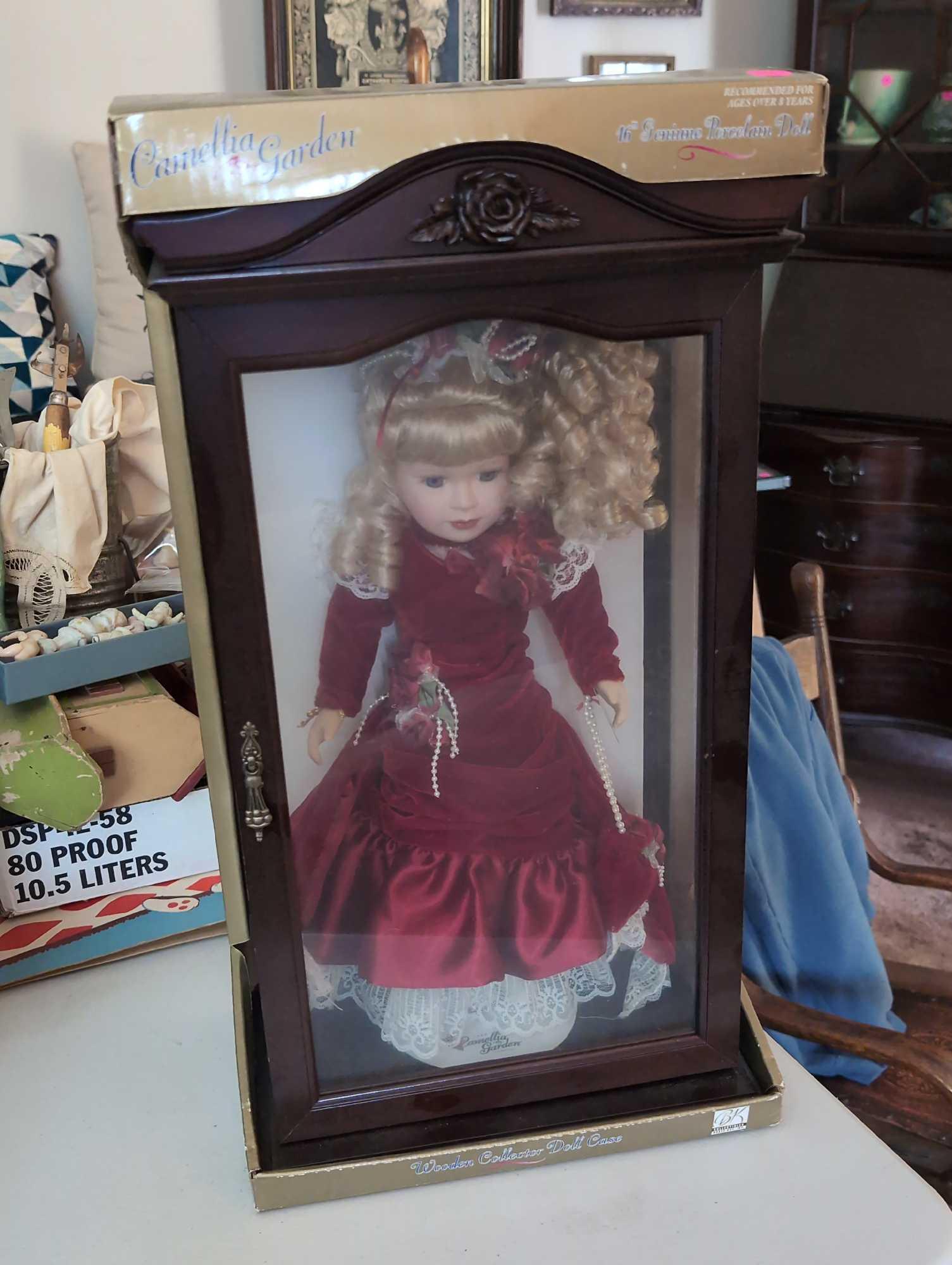 (LR) 1999 CAMELLIA GARDEN COLLECTION 16" GENUINE PORCELAIN DOLL WITH WOOD/GLASS DISPLAY CASE. IN