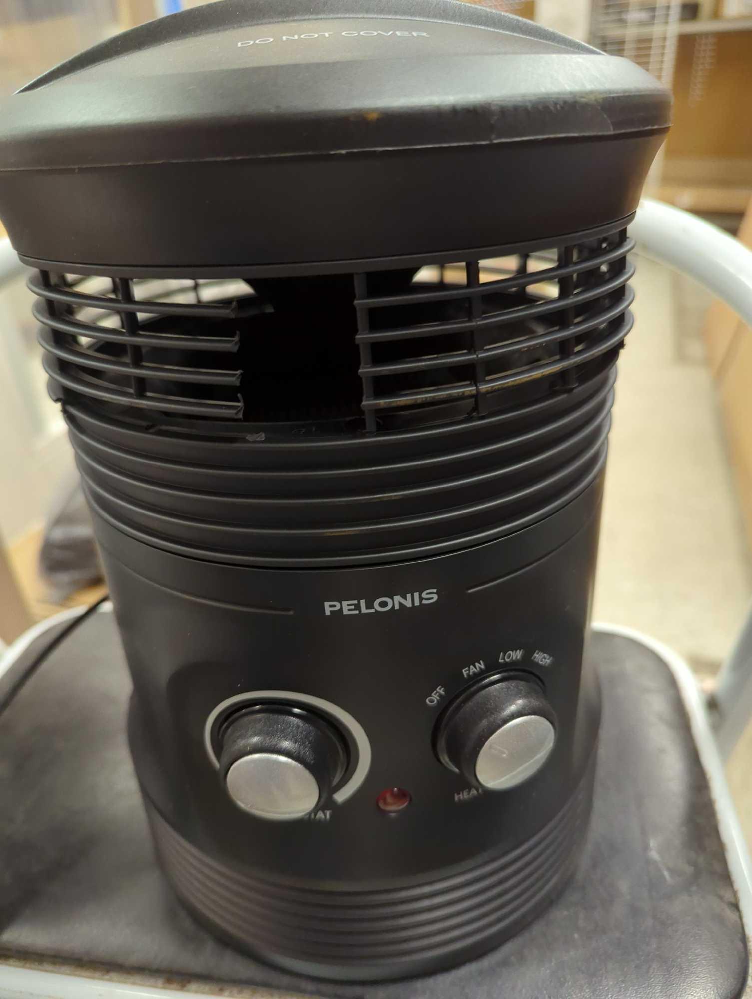 (Has Damage) Pelonis 1500-Watt 360... Surround Fan Heater, Appears to be New in Open Box Has Some