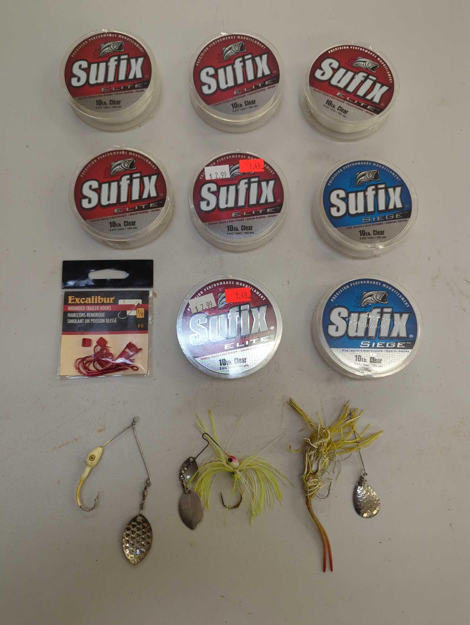 Small container and contents including fishing lines and other fishing accessories. Comes as is