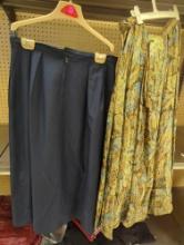 Lot of 2 Women's Long Skirts, One is A Navy Blue With A Back Zipper Size 14, And One is A Floral