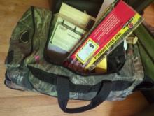 (LR) DUFFLE BAG LOT OF MISCELLANEOUS HUNTING ITEMS, HUNTER SAFETY STRAPS, DEER ANTLER, RIFLE REST,