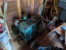 (SHED) ONAN ELECTRIC PORTABLE GENERATOR WITH WHEELS. USED CONDITION.