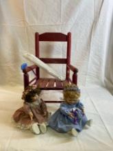 Vintage dolls and rocking chair.
