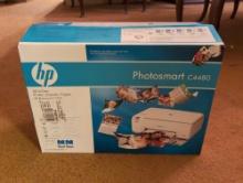 (DR) HP PHOTOSMART C4400 ALL-IN-ONE SERIES PRINTER. APPEARS TO HAVE NEVER BEEN TAKEN OUT OF THE BOX.