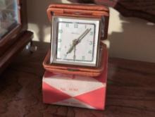(MBR) VINTAGE GENUINE LEATHER BLESSING TRAVEL ALARM CLOCK MADE IN WEST GERMANY. COMES WITH ORIGINAL