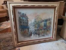 (UPOFC) FRAMED OIL IN CANVAS DEPICTING PEOPLE WALKING THROUGH THE STREETS OF A TOWN. SIGNED BY