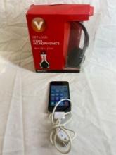 Brand New: Vivitar headphones and lightly used unlocked IPod Touch/8gb. Bluetooth ready.