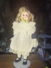 (GAR) Blonde Haired and Blue Eyed Porcelain Doll Wearing a Blue and White Dress, Approximately 17"
