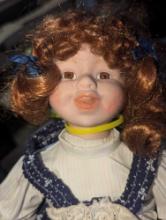 (GAR) Crowne Porcelain Doll with Red Hair and Brown Eyes Wearing a Blue Dress with White Under