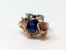 .925 STERLING & 14KT GOLD OVERLAY PLATE COCKTAIL RING WITH EXQUISITE 6 CT. ROYAL BLUE OVAL SAPPHIRE