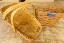 Pair of Handled Longaberger Baskets - 7.5" x 13" x 8" and 7" x 9" x 5.25"