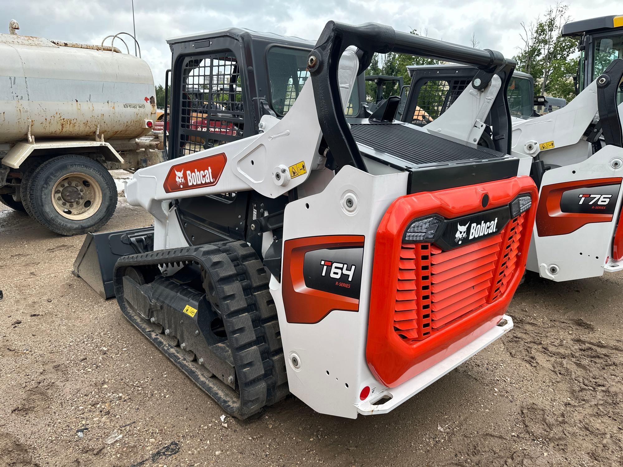 2023 BOBCAT T64 RUBBER TRACKED SKID STEER powered by diesel engine, equipped with rollcage,