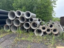 APPROX (39) PIECES OF ASSORTED SIZE REINFORCED CONCRETE PIPE SUPPORT EQUIPMENT