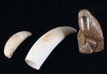 Antique Sperm Whale teeth & Inuit Walrus Statue