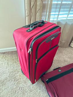 Two Pieces of Tag Luggage and American Tourists Garment Bag