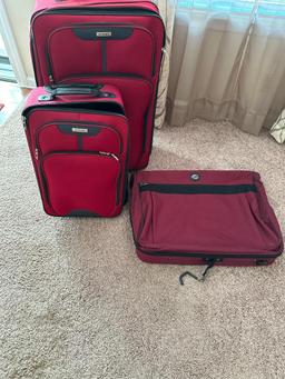 Two Pieces of Tag Luggage and American Tourists Garment Bag