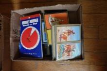 BOX OF PLAYING CARDS WITH BRIDGE SCORER AND PAD