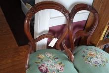 PAIR OF MAHOGANY SIDE CHAIRS WITH NEEDLE POINT SEATS AND CARVED BACKS