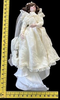 (1) 15 1/2” Porcelain Doll and (1) 18 1/2”