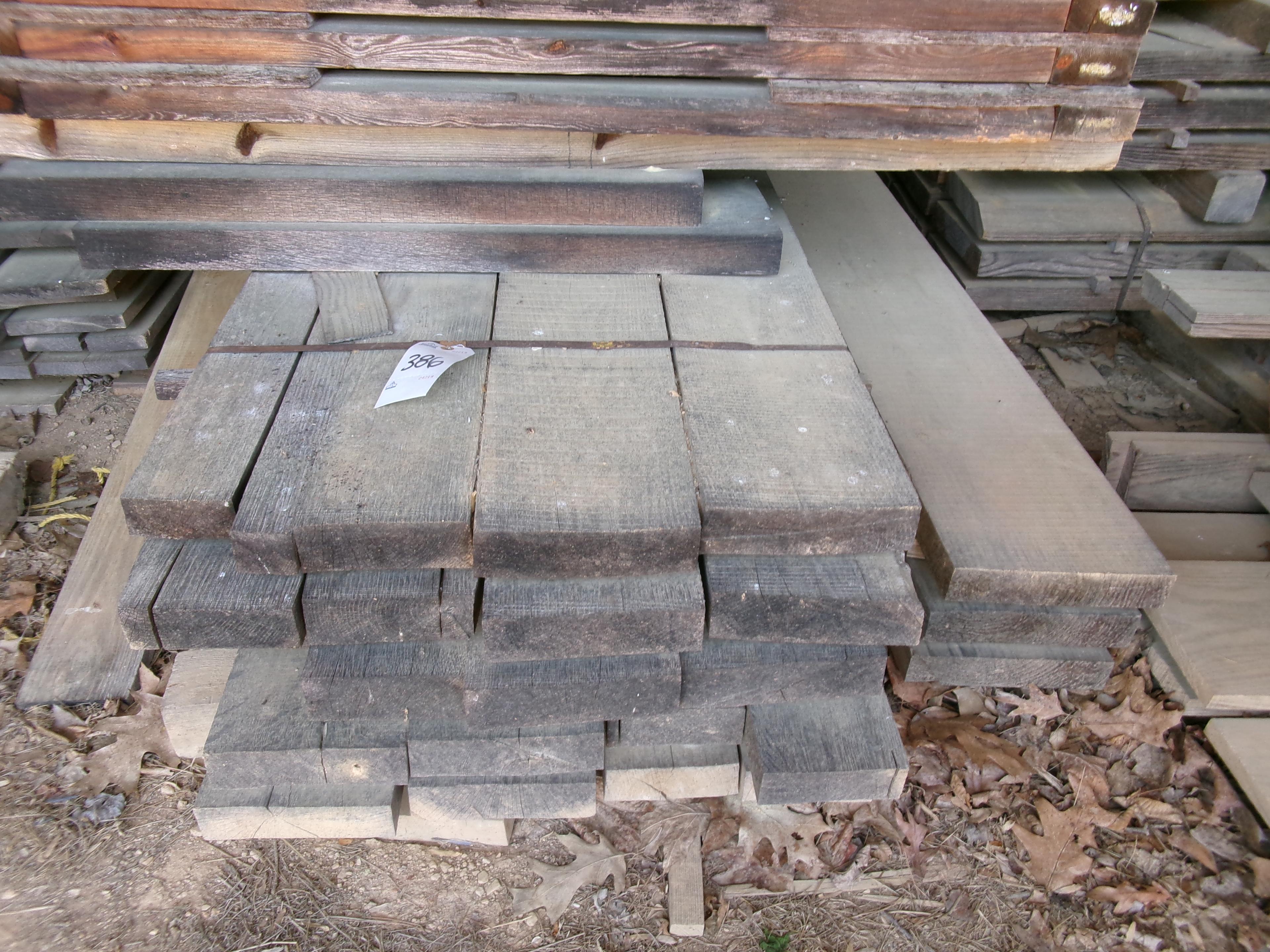 PILE OF ROUGH CUT LUMBER